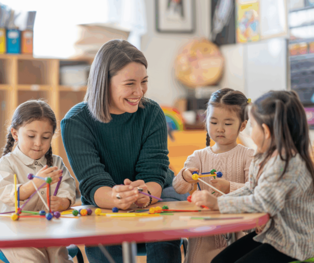 2025/12/Teacher-Image-scaled-e1766040108827.png